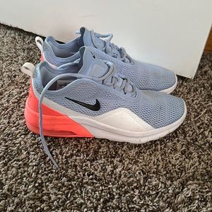 Woman, tennis shoes brand Nike air